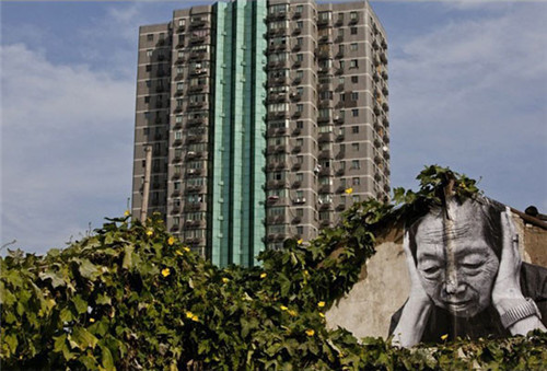 JR遍布全球的城市街头艺术作品